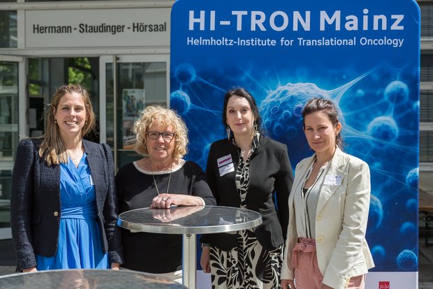 a Photo of the 4 members of the Coordination Team. Left to right: Julia Neuhaus, Marion Drechsel, Nadine Lampinen, Katharina Wolf