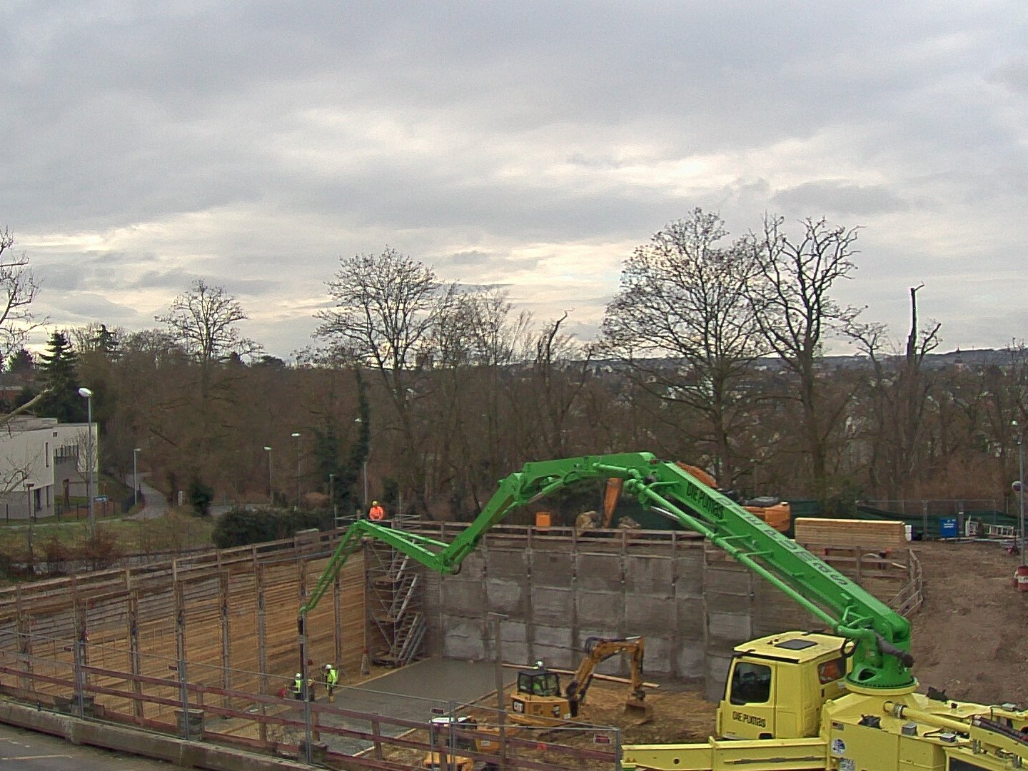 Photo of an excavator on the new building site